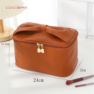PU Soft Leather New Arrival Travel Portable Makeup Bags Storage Large Capacity Waterproof Stylish Bow Handle Cosmetic Bag